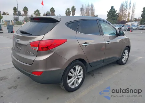 2010 Hyundai Tucson Limited z USA, uszkodzony, nr VIN KM8JU3AC1AU016345